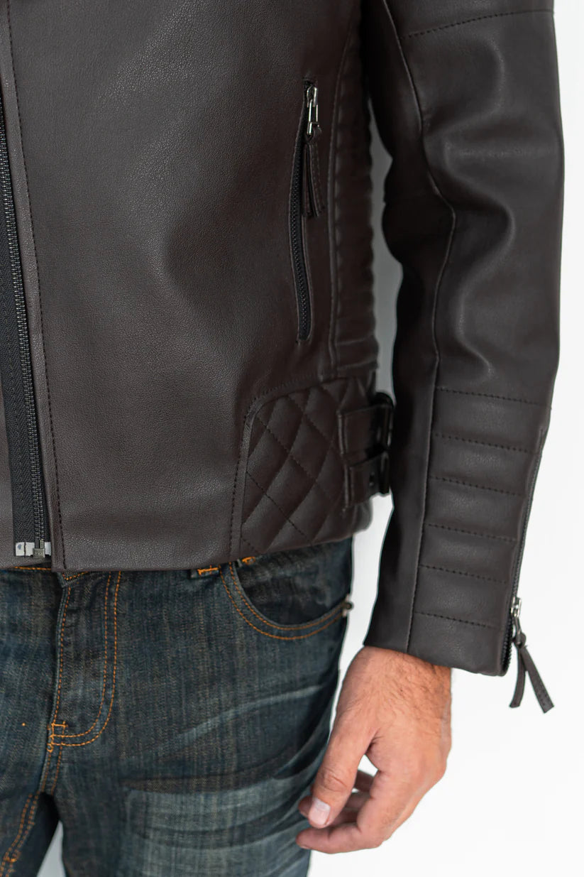 Exterior zip pocket detail on brown quilted faux leather jacket